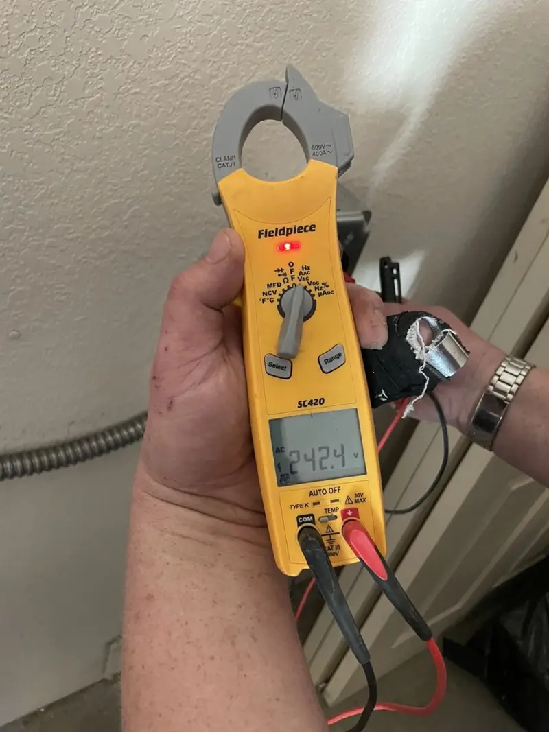 Voltage testing with clamp meter during Hot Tub / Pool Electrical Wiring in Hiawatha